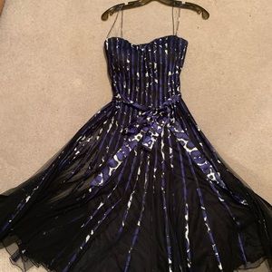 Dress.  Size 14.  True to size. Very elegant.